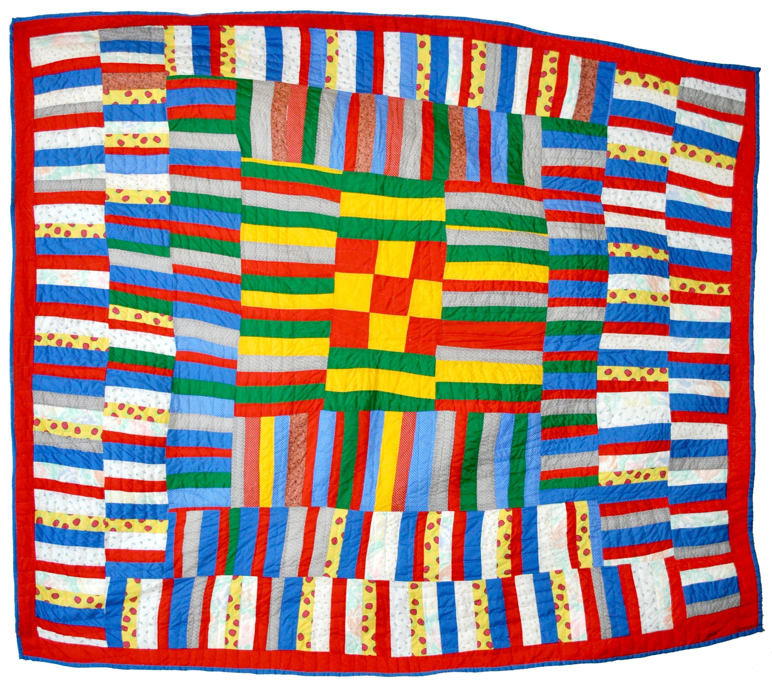 Lucy Mingo, a descendant of several generations of Gee’s Bend quilters, and leading spokeswoman for Gee’s Bend, made this quilt in 1979. We use this photo as an illustration of African-American quilting rather than one of Rosie Lee Tompkins as she did not like to be photographed