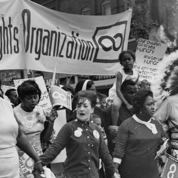 National Welfare Rights Organization members march through Shaw, Washington DC in 1968.
