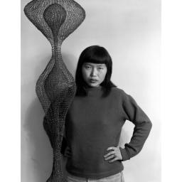 Ruth Asawa with hanging wire sculpture