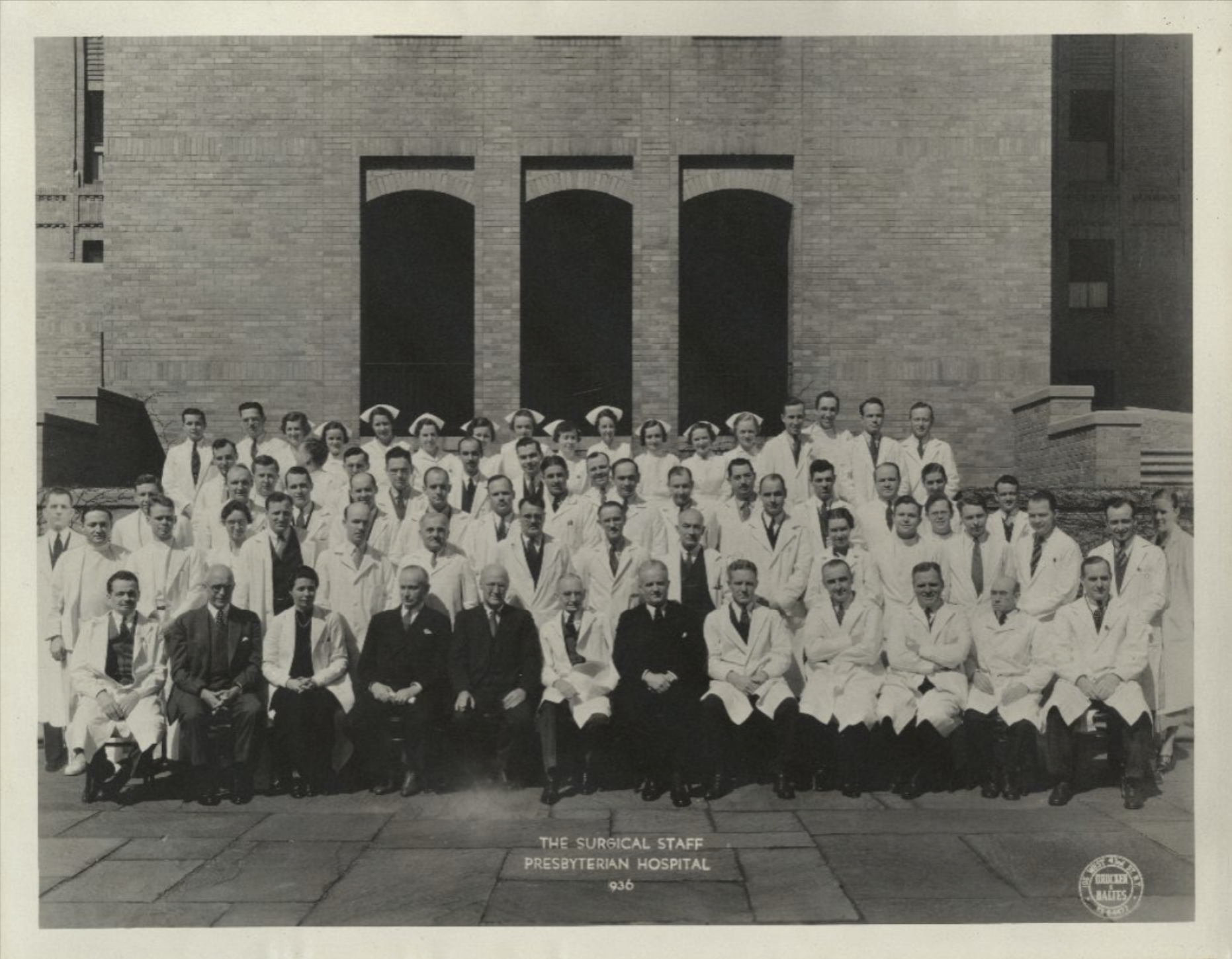 The surgical staff of Presbyterian Hospital pose for a portrait.