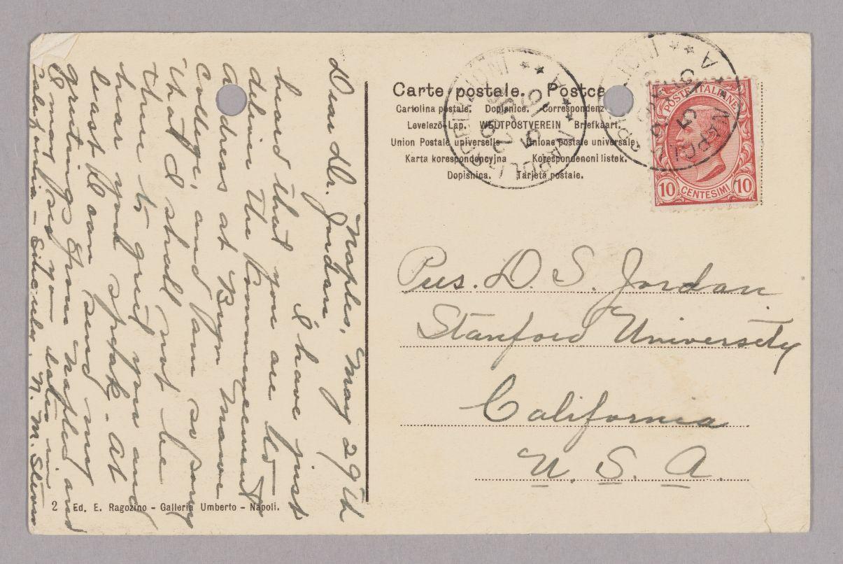 Backside of postcard with Nettie Stevens cursive handwriting and a red stamp.