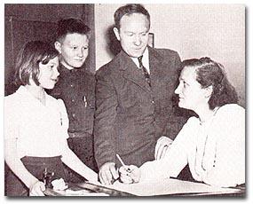 Payne-Gaposchkin and her family in her office