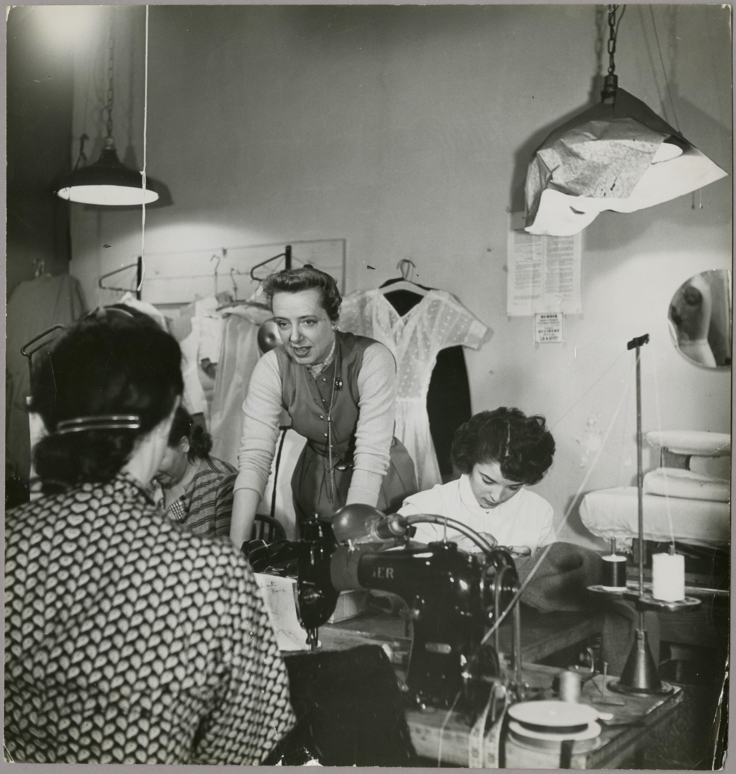 Claire McCardell talking with dressmakers
