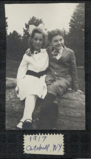 Virginia and her brother Lawrence sit poised on a rock for a portrait.