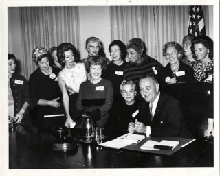 Helen Taussig sitting by President Lyndon B Johnson