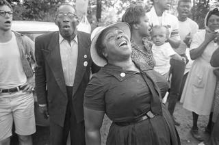 Fannie Hamer singing to a group of people during the "March Against Fear" through Mississippi