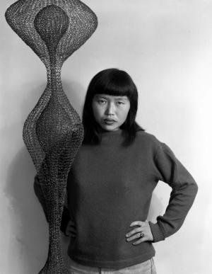 Ruth Asawa with hanging wire sculpture