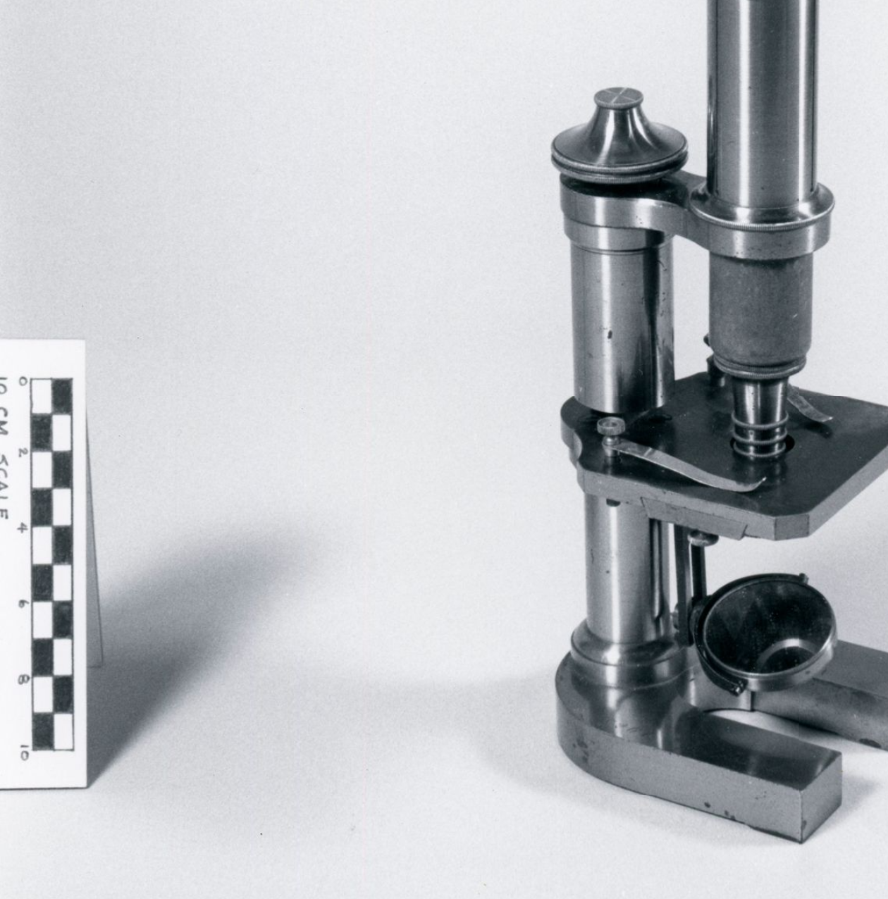Black and white close-up photograph of microscope
